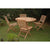 A table and chairs on a lawn - Anderson Teak Andrew Butterfly Folding 5-Pieces Dining Set.