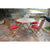 A patio with a table and chairs - Anderson Teak Bahama Classic 5-Pieces Folding Dining Set.