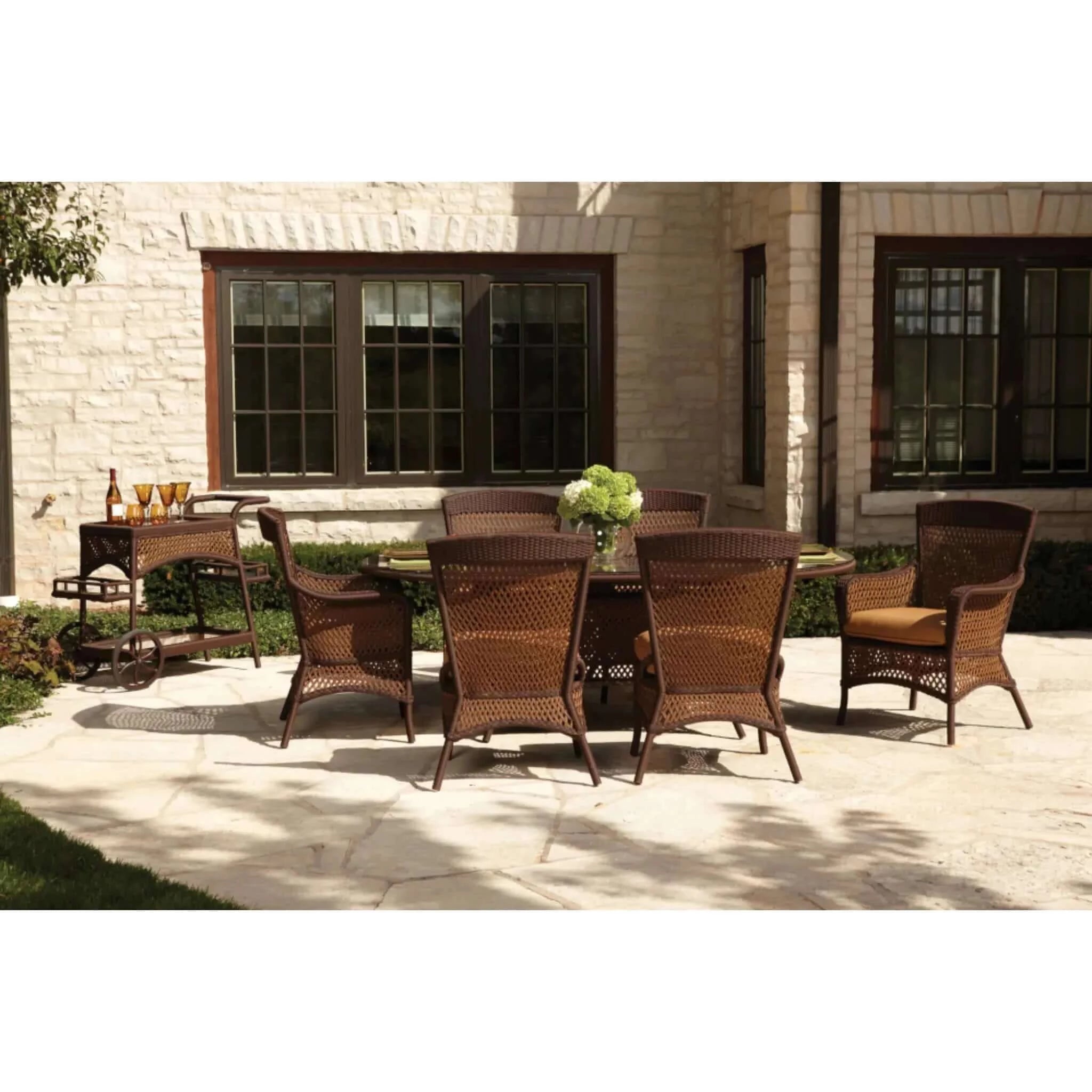 lloyd flanders patio umbrella Grand Traverse Wicker Rattan Dining Table Lloyd Flanders Finish: Caramel